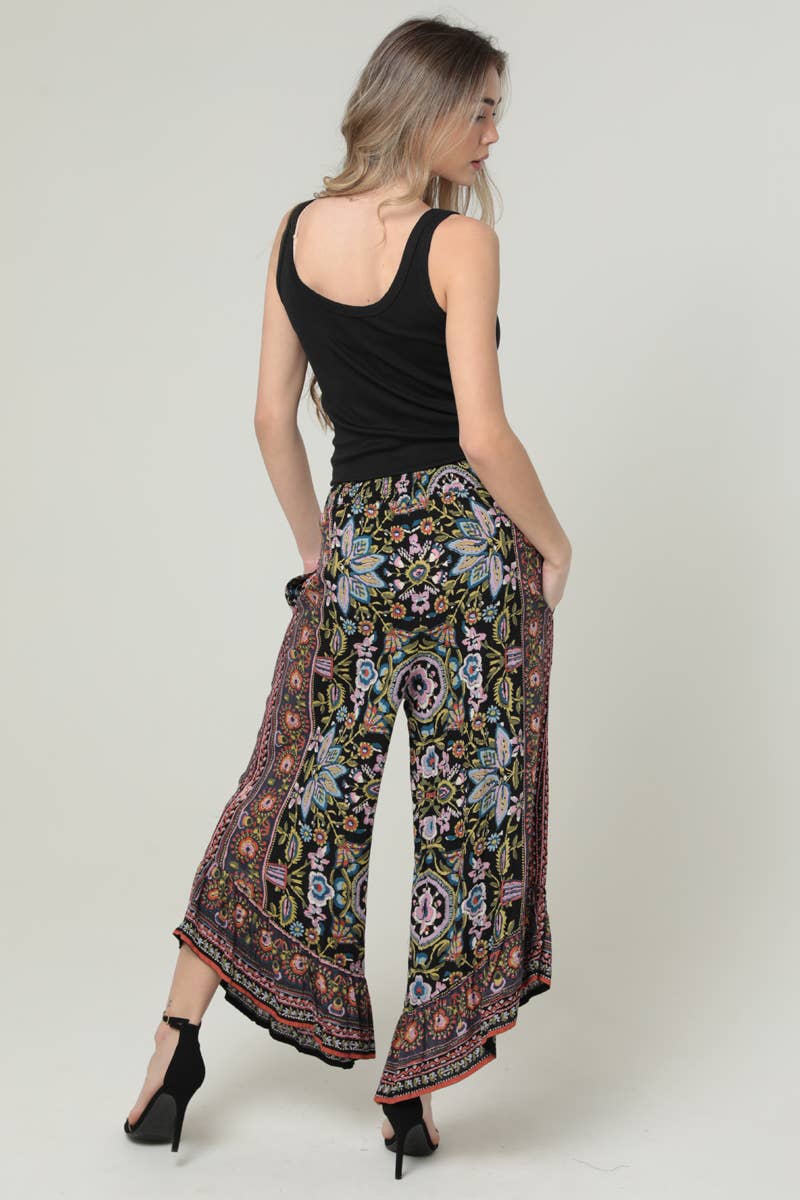 ANGLED HEM SMOCKED WAIST PRINTED WIDE LEG PANTS