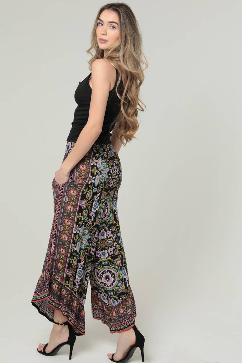 ANGLED HEM SMOCKED WAIST PRINTED WIDE LEG PANTS