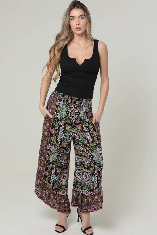 ANGLED HEM SMOCKED WAIST PRINTED WIDE LEG PANTS