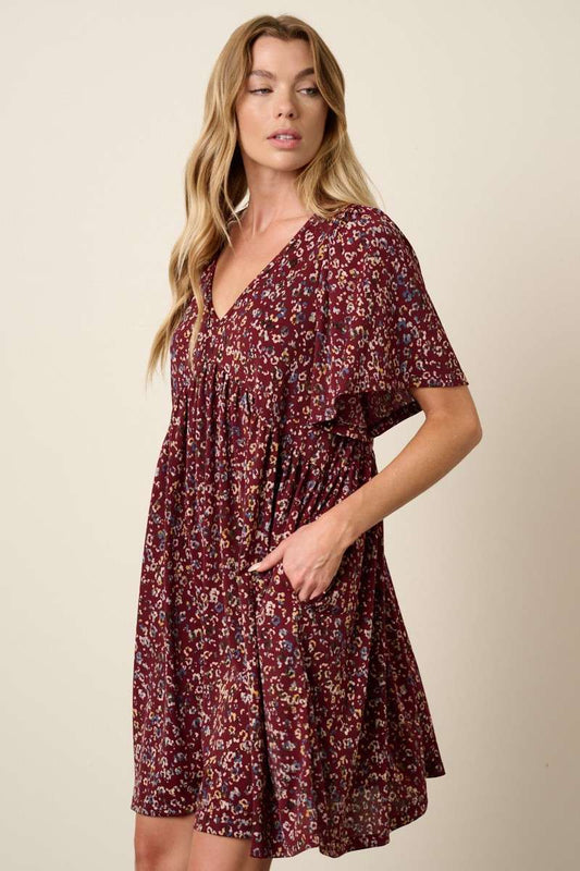 ANIMAL PRINT BABYDOLL MINI DRESS