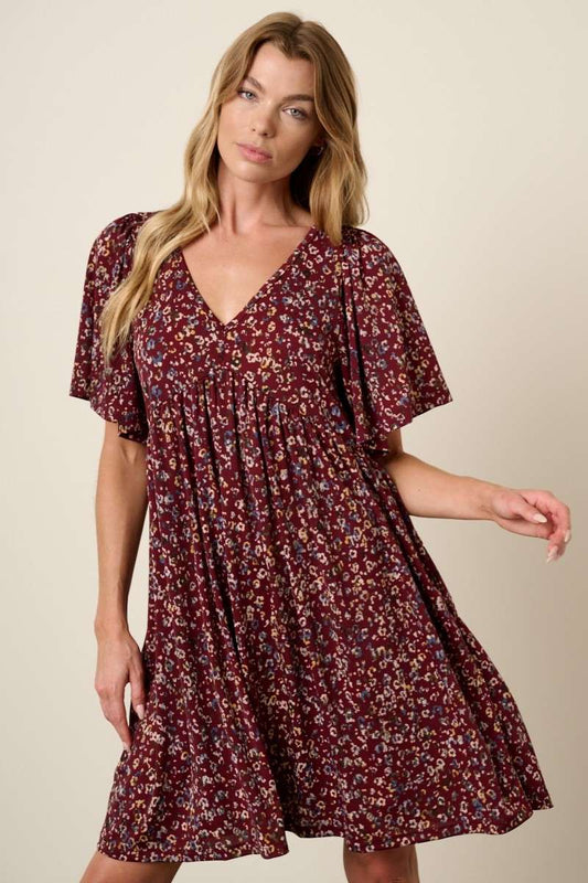 ANIMAL PRINT BABYDOLL MINI DRESS