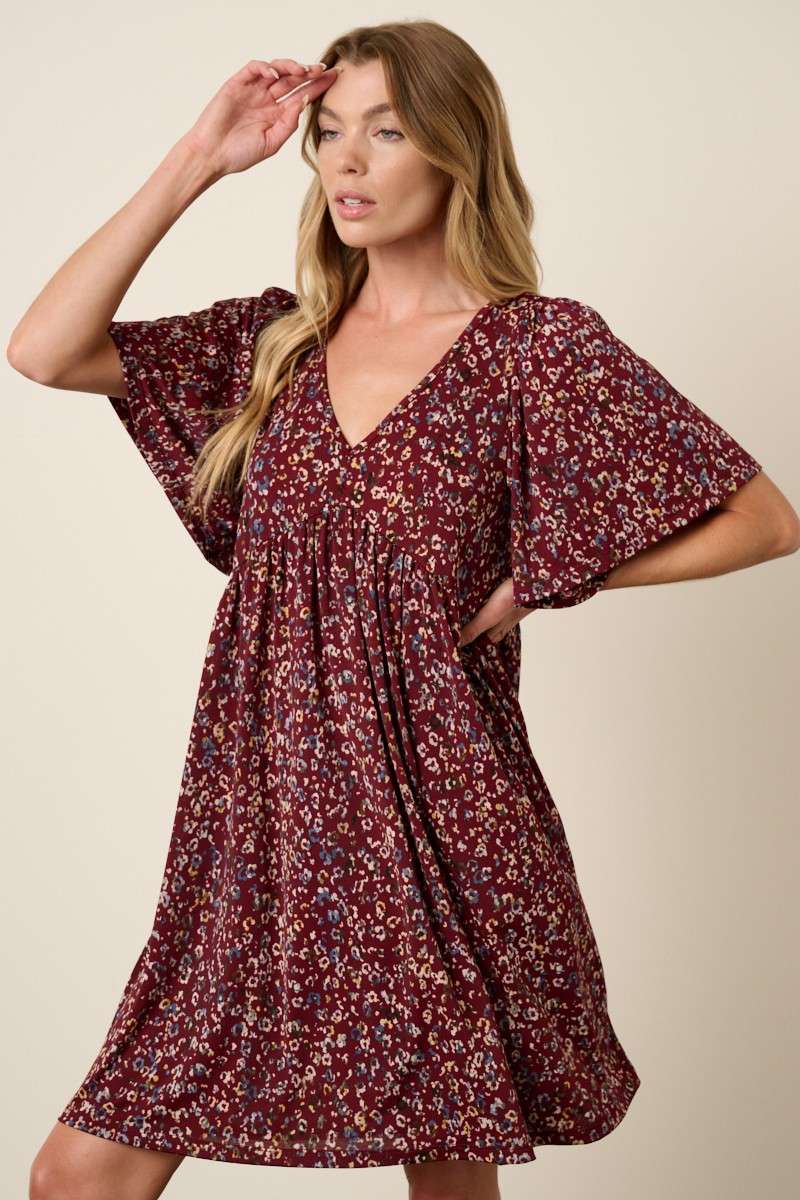 ANIMAL PRINT BABYDOLL MINI DRESS