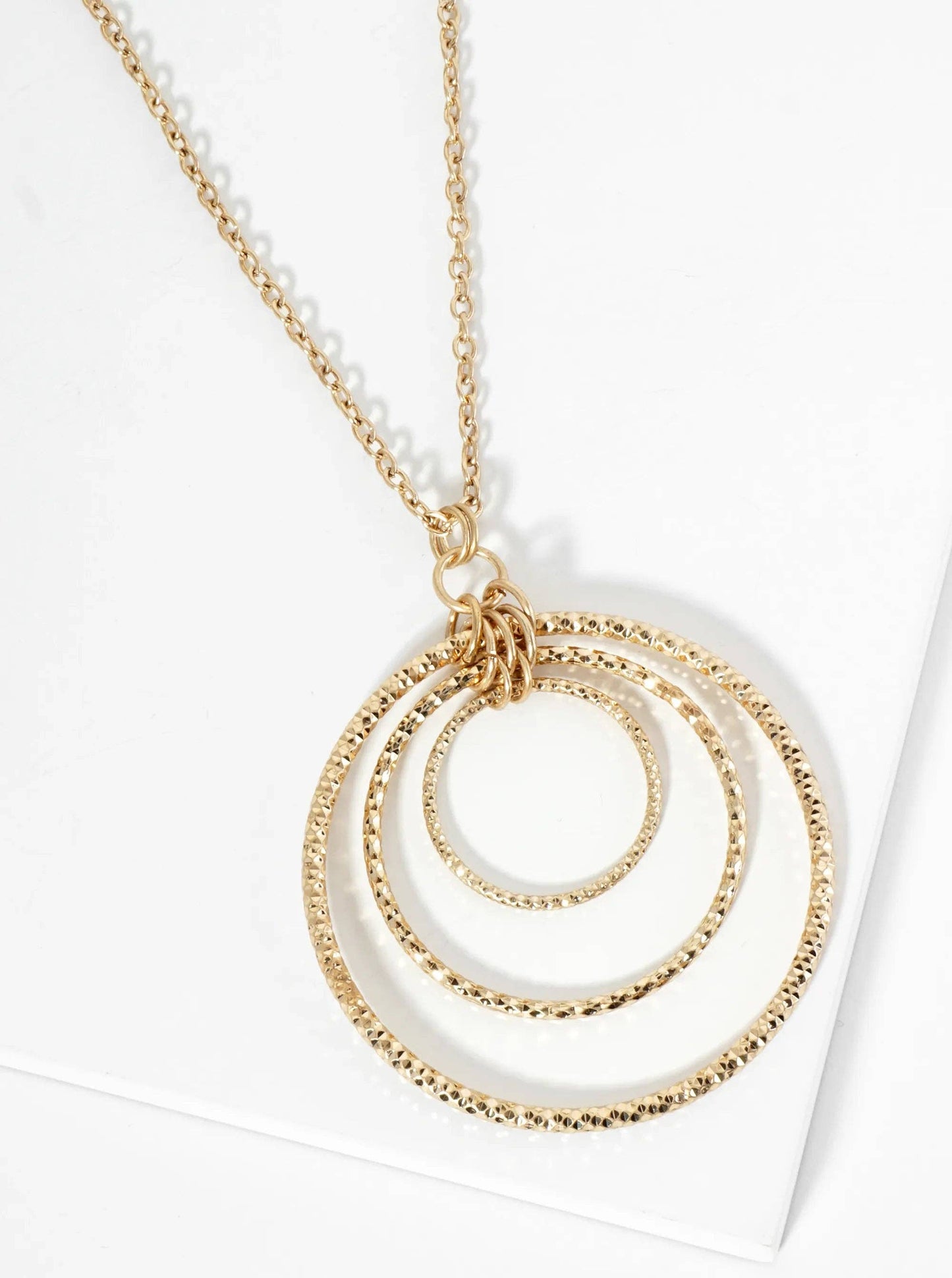 Graduated Sparkling Textured Circle Pendant Necklace