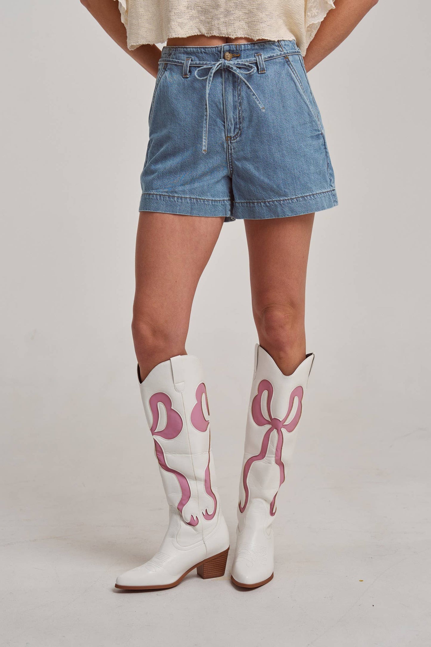 HIGH RISE DENIM SHORTS WITH STRAP TIE AT THE WAISTBAND