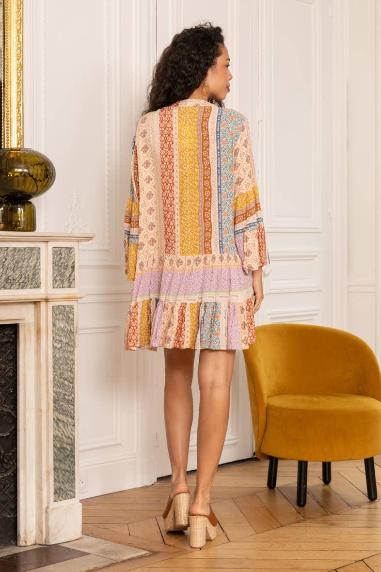 Ethnic print tunic dress buttoned at the front.